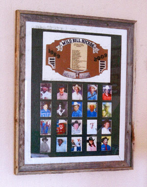 Framed artwork featuring buckle honor recipients; donated by Beverly Willcoxon of Abilene, Kansas