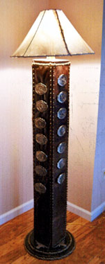 Custom Western floor lamp featuring the buckles from the Wild Bill Hickok Rodeo Series; donated by Beverly Willcoxon of Abilene, Kansas